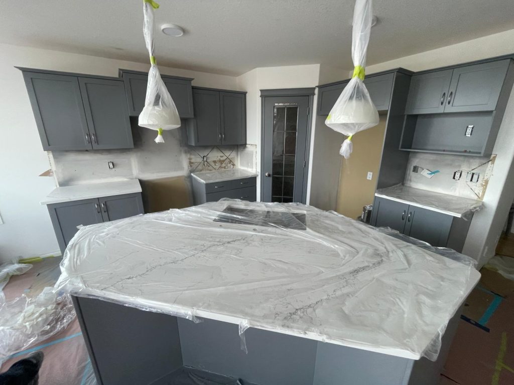 Quartz countertop installation with custom island in Calgary