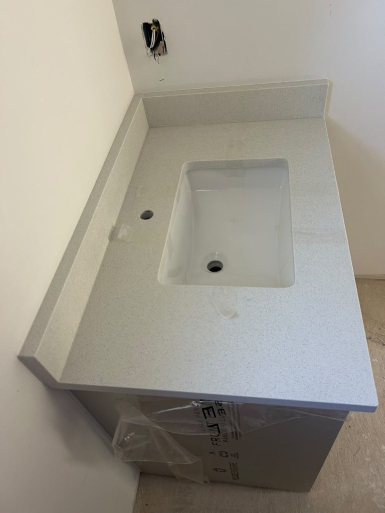 Quartz bathroom vanity top with integrated sink, Calgary
